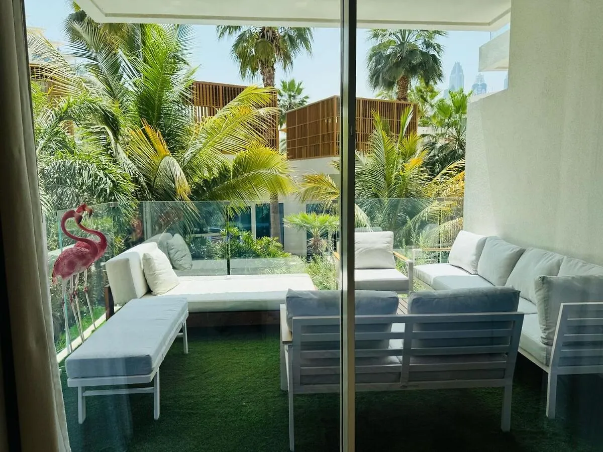 Luxe Apt With Pool View - Lush Greenery I Beach Access Dubai Apartment